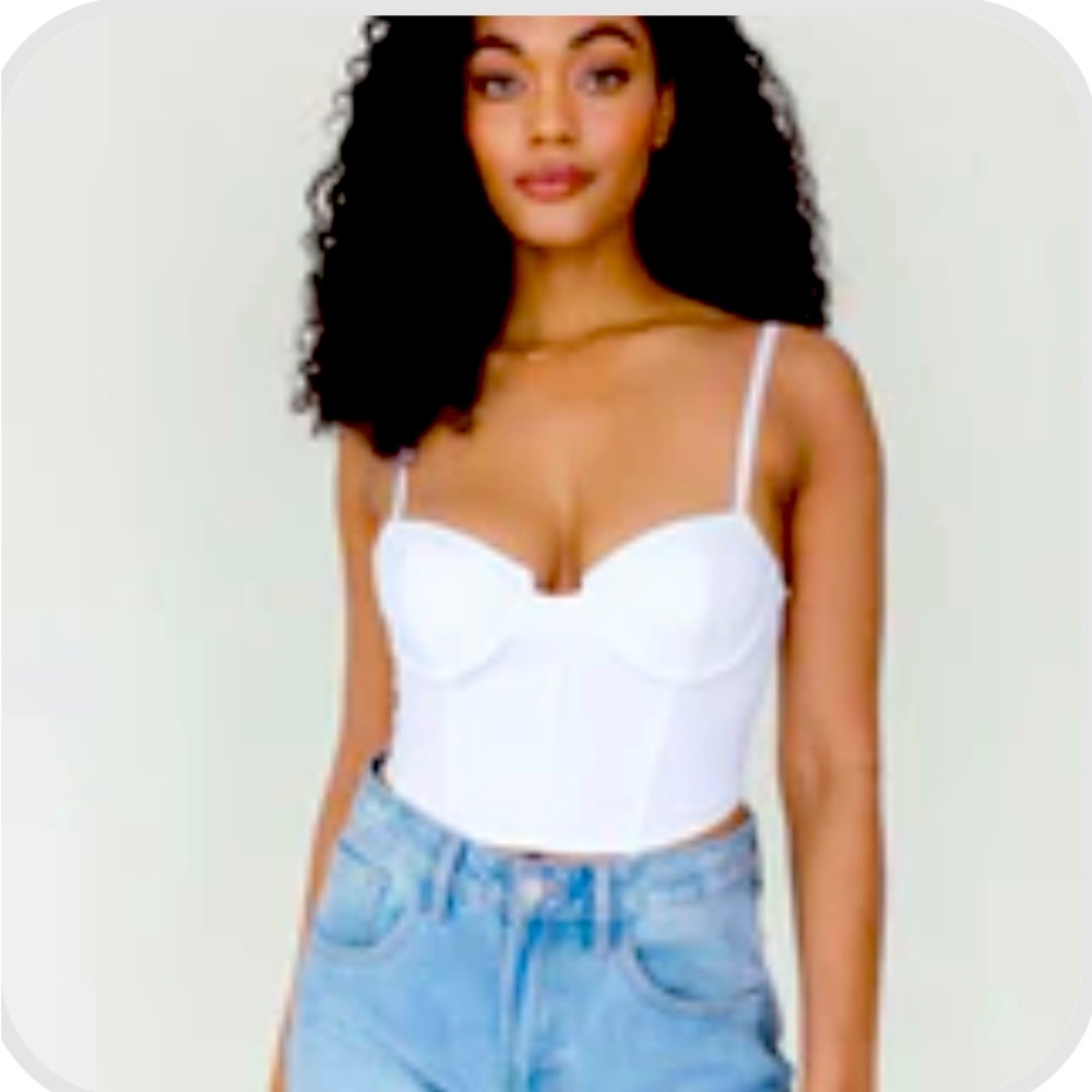 Brand New, Never Worn.  White Corset Top.  Size small.
